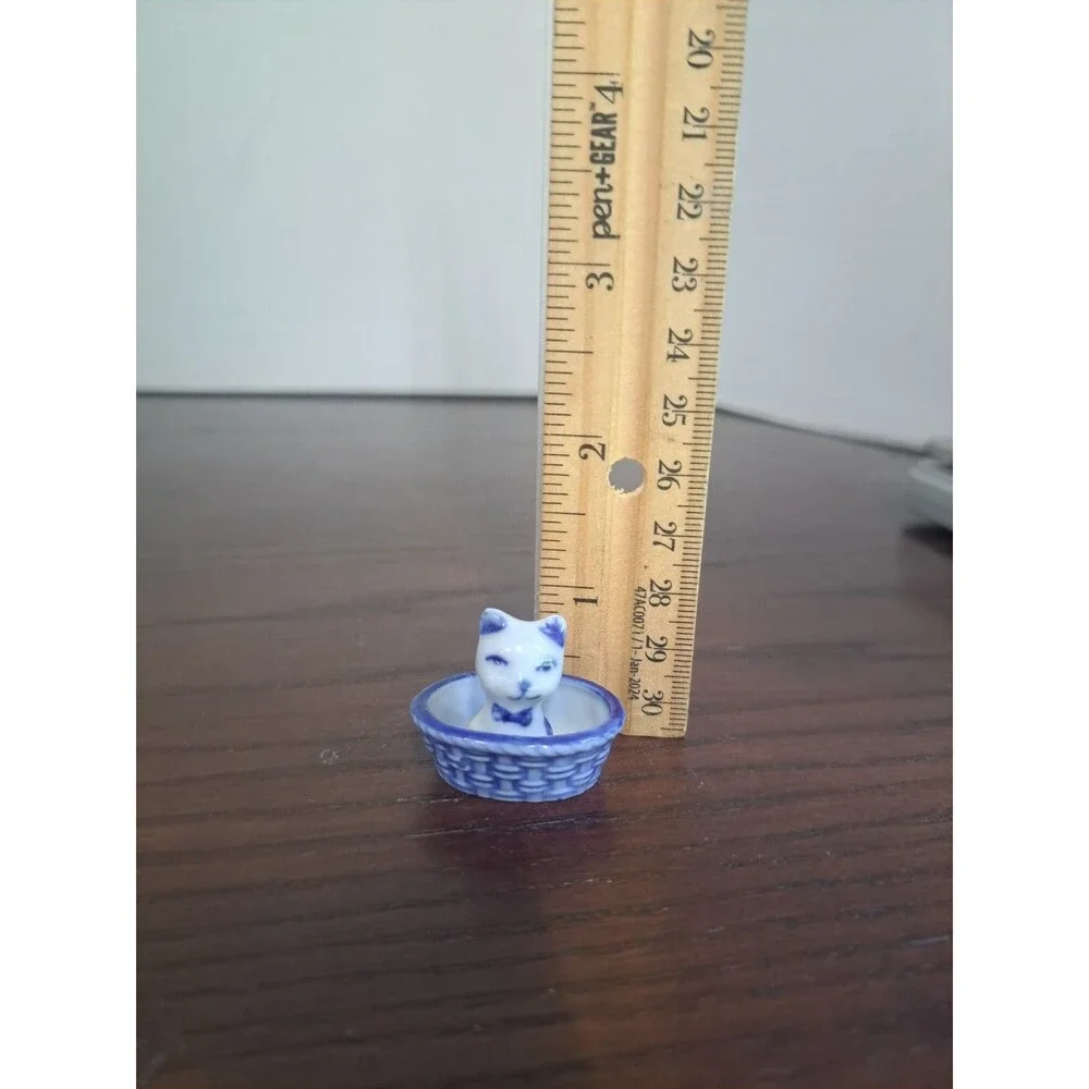 Miniature Delft Style White And Blie Kitten In A Basket Porcelain Figurine